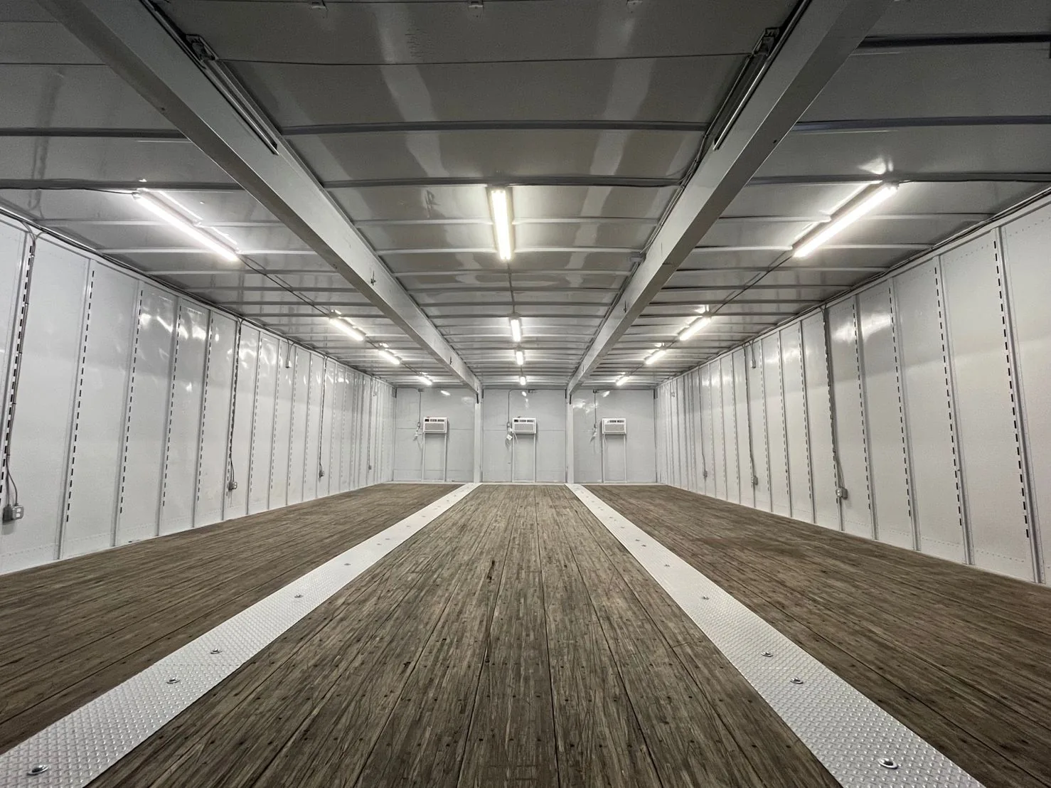 Legacy finished cargo interior with reinforced surfaces