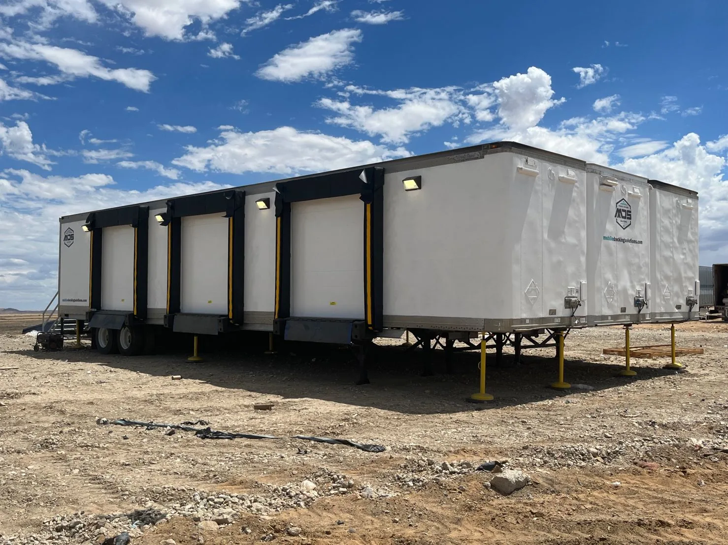 Legacy four-door mobile dock deployed at a remote work site