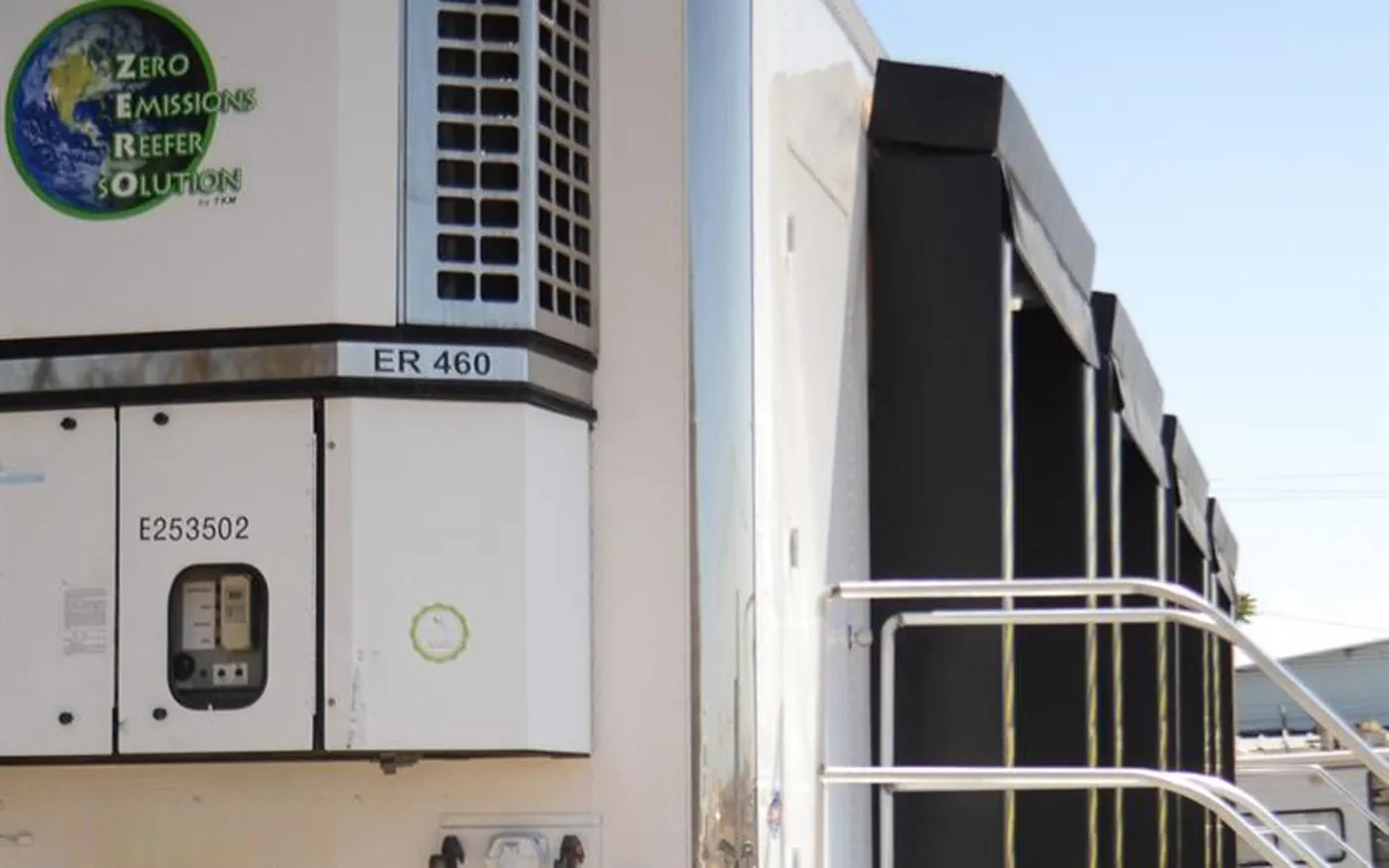 Refrigeration equipment beside multiple mobile dock openings